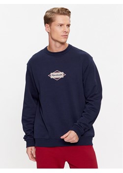Reebok Bluza Sporting Goods IM1503 Granatowy Regular Fit ze sklepu MODIVO w kategorii Bluzy męskie - zdjęcie 181115278