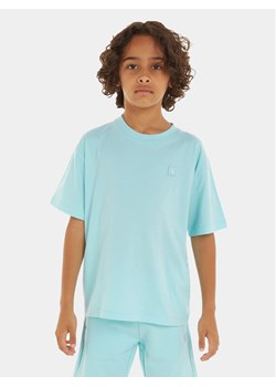 Calvin Klein Jeans T-Shirt Mono Mini Badge IU0IU00580 M Niebieski Regular Fit ze sklepu MODIVO w kategorii T-shirty chłopięce - zdjęcie 181115356