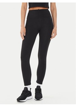 adidas Legginsy Lounge Ribbed IP2281 Czarny Slim Fit ze sklepu MODIVO w kategorii Spodnie damskie - zdjęcie 181115647