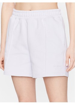 New Balance Szorty sportowe WS23552 Fioletowy Relaxed Fit ze sklepu MODIVO w kategorii Szorty - zdjęcie 181116708