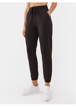 DKNY Spodnie dresowe YI2822670 Czarny Regular Fit - id: 0000303047726 - marki DKNY - 181116996 DKNY Spodnie dresowe YI2822670 Czarny Regular Fit ze sklepu MODIVO w kategorii Spodnie damskie - zdjęcie 181116996
