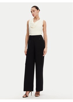 DKNY Kombinezon DD4JGD26 Czarny Regular Fit ze sklepu MODIVO w kategorii Kombinezony damskie - zdjęcie 181117958