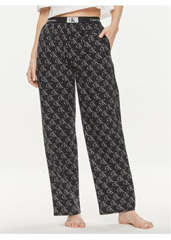 Calvin Klein Underwear Spodnie piżamowe 000QS6973E Czarny Relaxed Fit ze sklepu MODIVO w kategorii Piżamy damskie - zdjęcie 181118408