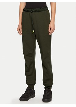 Champion Spodnie dresowe 117477 Zielony Slim Fit ze sklepu MODIVO w kategorii Spodnie damskie - zdjęcie 181118925
