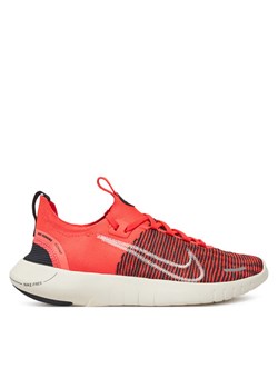 Nike Buty do biegania Free RN NN DX6482 Pomarańczowy ze sklepu MODIVO w kategorii Buty sportowe damskie - zdjęcie 181119275