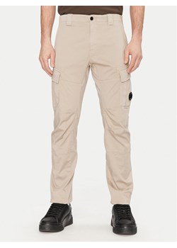C.P. Company Spodnie materiałowe 18CMPA056A005694G Khaki Regular Fit ze sklepu MODIVO w kategorii Spodnie męskie - zdjęcie 181121297