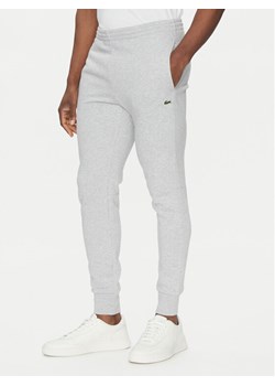 Lacoste Spodnie dresowe XH9624 Szary Regular Fit ze sklepu MODIVO w kategorii Spodnie męskie - zdjęcie 181121518