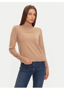 Guess Jeans Golf W4BR15 Z3HO2 Beżowy Regular Fit ze sklepu MODIVO w kategorii Swetry damskie - zdjęcie 181124469