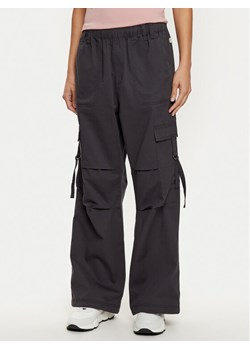 Champion Spodnie dresowe 117503 Szary Oversize ze sklepu MODIVO w kategorii Spodnie damskie - zdjęcie 181125517