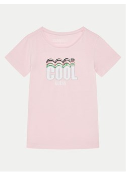 Guess T-Shirt K5RI17 K6YW4 Różowy Regular Fit ze sklepu MODIVO w kategorii Bluzki dziewczęce - zdjęcie 181126488