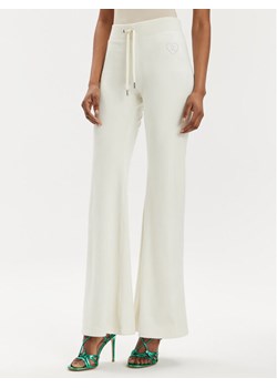Juicy Couture Spodnie dresowe Rodeo Layla JCBBJ223823 Écru Regular Fit ze sklepu MODIVO w kategorii Spodnie damskie - zdjęcie 181127935