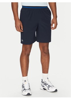 Lacoste Szorty sportowe GH7413 Granatowy Regular Fit ze sklepu MODIVO w kategorii Spodenki męskie - zdjęcie 181128166