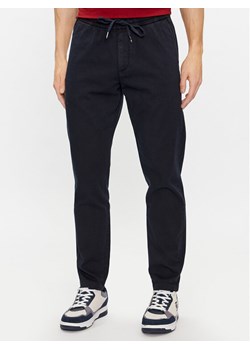 Tommy Hilfiger Chinosy Chelsea MW0MW33918 Granatowy Slim Fit ze sklepu MODIVO w kategorii Spodnie męskie - zdjęcie 181130229