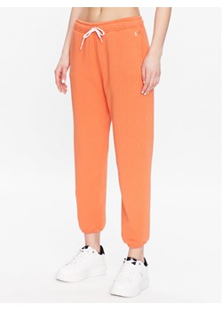 Polo Ralph Lauren Spodnie dresowe 211891560005 Pomarańczowy Regular Fit ze sklepu MODIVO w kategorii Spodnie damskie - zdjęcie 181130735