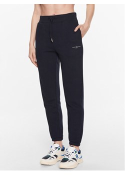 Tommy Hilfiger Spodnie dresowe 1985 WW0WW38690 Granatowy Tapered Fit ze sklepu MODIVO w kategorii Spodnie damskie - zdjęcie 181131429