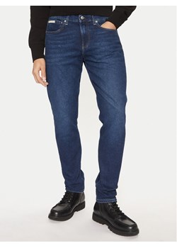 Calvin Klein Jeans Jeansy J30J327007 Granatowy Slim Fit ze sklepu MODIVO w kategorii Jeansy męskie - zdjęcie 181132289