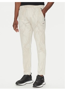 BOSS Spodnie dresowe Hicon Desert Active 50537761 Beżowy Slim Fit ze sklepu MODIVO w kategorii Spodnie męskie - zdjęcie 181132296