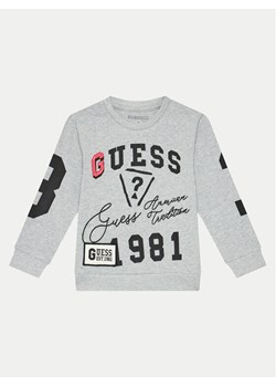 Guess Bluzka N4BI13 K8VA3 Szary Regular Fit ze sklepu MODIVO w kategorii Bluzki dziewczęce - zdjęcie 181132838