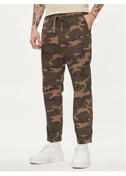 Gap Joggery 496157-00 Zielony Slim Fit ze sklepu MODIVO w kategorii Spodnie męskie - zdjęcie 181132926