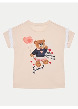 Guess T-Shirt K5RI12 K6YW4 Różowy Regular Fit ze sklepu MODIVO w kategorii Bluzki dziewczęce - zdjęcie 181133237
