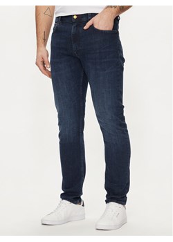 Tommy Hilfiger Jeansy Houston MW0MW34516 Granatowy Tapered Fit ze sklepu MODIVO w kategorii Jeansy męskie - zdjęcie 181134589