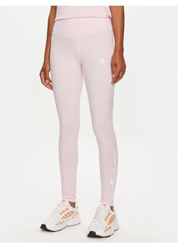 adidas Legginsy SPORT INSPIRED LOUNGEWEAR ESSENTIALS HIGH-WAISTED LOGO LEGGINGS ID0024 Różowy ze sklepu MODIVO w kategorii Spodnie damskie - zdjęcie 181136525