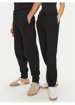 AMI PARIS Spodnie dresowe UTR237.749 Czarny Relaxed Fit ze sklepu MODIVO w kategorii Spodnie damskie - zdjęcie 181137206