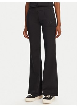 Juicy Couture Spodnie dresowe Active JCSML125403 Czarny Flared Leg ze sklepu MODIVO w kategorii Spodnie damskie - zdjęcie 181137215