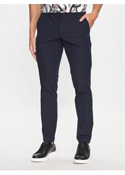 Boss Spodnie materiałowe Kaito1_T 50487754 Granatowy Slim Fit ze sklepu MODIVO w kategorii Spodnie męskie - zdjęcie 181137738