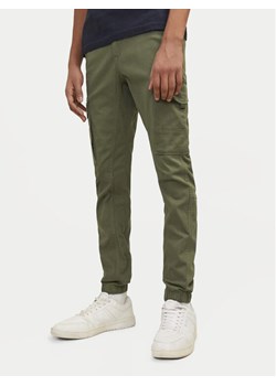 Jack&Jones Junior Spodnie materiałowe Paul 12151639 Zielony Slim Fit ze sklepu MODIVO w kategorii Spodnie chłopięce - zdjęcie 181137775