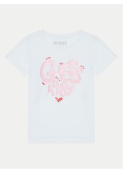Guess T-Shirt K5RI02 K6YW4 Biały Regular Fit ze sklepu MODIVO w kategorii Bluzki dziewczęce - zdjęcie 181137998