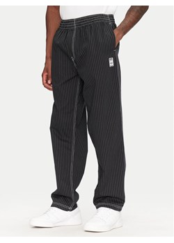 adidas Spodnie dresowe Wabash JP4489 Czarny Loose Fit ze sklepu MODIVO w kategorii Spodnie męskie - zdjęcie 181138499