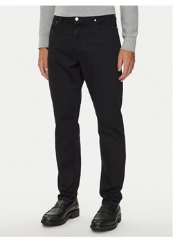 Calvin Klein Jeansy K10K112535 Czarny Tapered Fit ze sklepu MODIVO w kategorii Jeansy męskie - zdjęcie 181138667