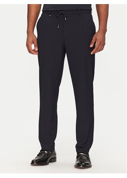BOSS Spodnie materiałowe C-Perin 50540791 Granatowy Tapered Fit ze sklepu MODIVO w kategorii Spodnie męskie - zdjęcie 181139377
