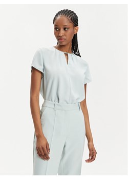 Calvin Klein Bluzka K20K207062 Błękitny Regular Fit ze sklepu MODIVO w kategorii Bluzki damskie - zdjęcie 181139547