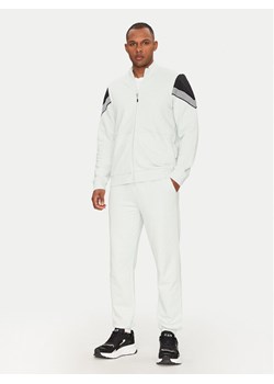 EA7 Emporio Armani Dres 7M000268 AF12451 U9060 Niebieski Regular Fit ze sklepu MODIVO w kategorii Dresy męskie - zdjęcie 181141985