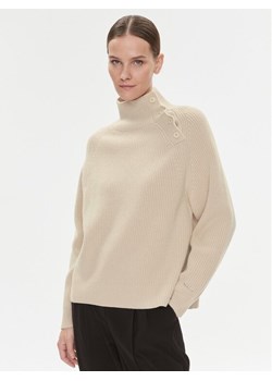 Calvin Klein Golf K20K206014 Beżowy Relaxed Fit ze sklepu MODIVO w kategorii Swetry damskie - zdjęcie 181142397