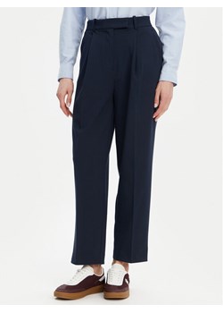 Tommy Hilfiger Chinosy WW0WW44793 Granatowy Tapered Fit ze sklepu MODIVO w kategorii Spodnie damskie - zdjęcie 181143398