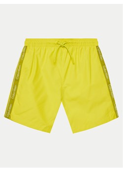 Calvin Klein Swimwear Szorty kąpielowe KV0KV00058 Żółty Regular Fit ze sklepu MODIVO w kategorii Kąpielówki chłopięce - zdjęcie 181143959