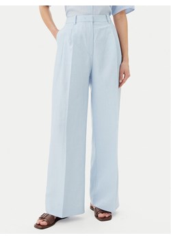 Tommy Hilfiger Spodnie materiałowe WW0WW45460 Niebieski Relaxed Fit ze sklepu MODIVO w kategorii Spodnie damskie - zdjęcie 181144356