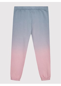Vans Spodnie dresowe Sunset Wash VN0A7YVQ Szary Regular Fit ze sklepu MODIVO w kategorii Spodnie dziewczęce - zdjęcie 181145006