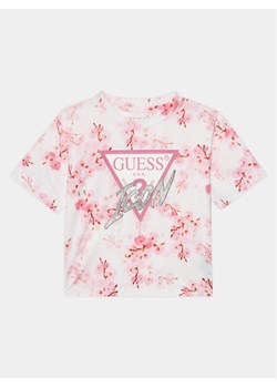 Guess T-Shirt J4RI06 K6YW3 Różowy Boxy Fit ze sklepu MODIVO w kategorii Bluzki dziewczęce - zdjęcie 181146298