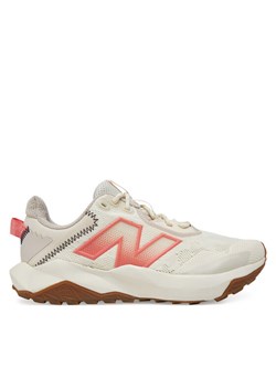 New Balance Buty do biegania Nitrel WTNTRCS6 Beżowy ze sklepu MODIVO w kategorii Buty sportowe damskie - zdjęcie 181146845