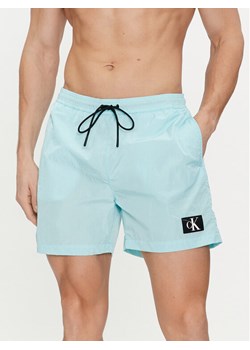 Calvin Klein Swimwear Szorty kąpielowe KM0KM00980 Niebieski Regular Fit ze sklepu MODIVO w kategorii Kąpielówki - zdjęcie 181147747