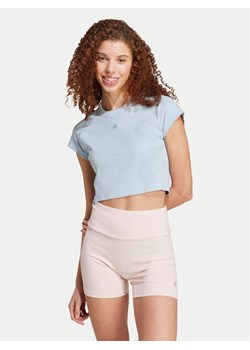 adidas T-Shirt Lounge IY6744 Błękitny Slim Fit ze sklepu MODIVO w kategorii Bluzki damskie - zdjęcie 181149136