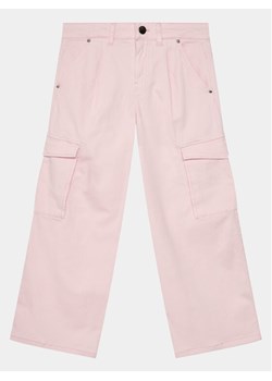 Guess Spodnie materiałowe J4RB14 WEHD0 Różowy Relaxed Fit ze sklepu MODIVO w kategorii Spodnie dziewczęce - zdjęcie 181149306