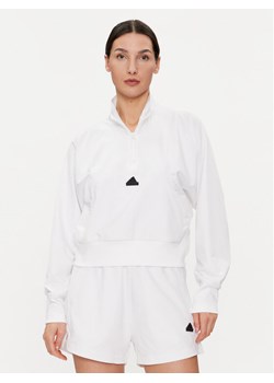 adidas Bluza Z.N.E. IN9478 Biały Relaxed Fit ze sklepu MODIVO w kategorii Bluzy damskie - zdjęcie 181149635