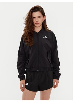 adidas Kurtka bomber Essentials 3-Stripes JD5317 Czarny Loose Fit ze sklepu MODIVO w kategorii Kurtki damskie - zdjęcie 181150599