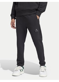 adidas Spodnie dresowe ALL SZN French Terry IV5216 Czarny Loose Fit ze sklepu MODIVO w kategorii Spodnie męskie - zdjęcie 181151458