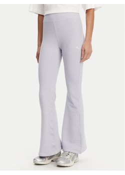 Puma Legginsy Dare To 629809 Fioletowy Slim Fit ze sklepu MODIVO w kategorii Spodnie damskie - zdjęcie 181153165